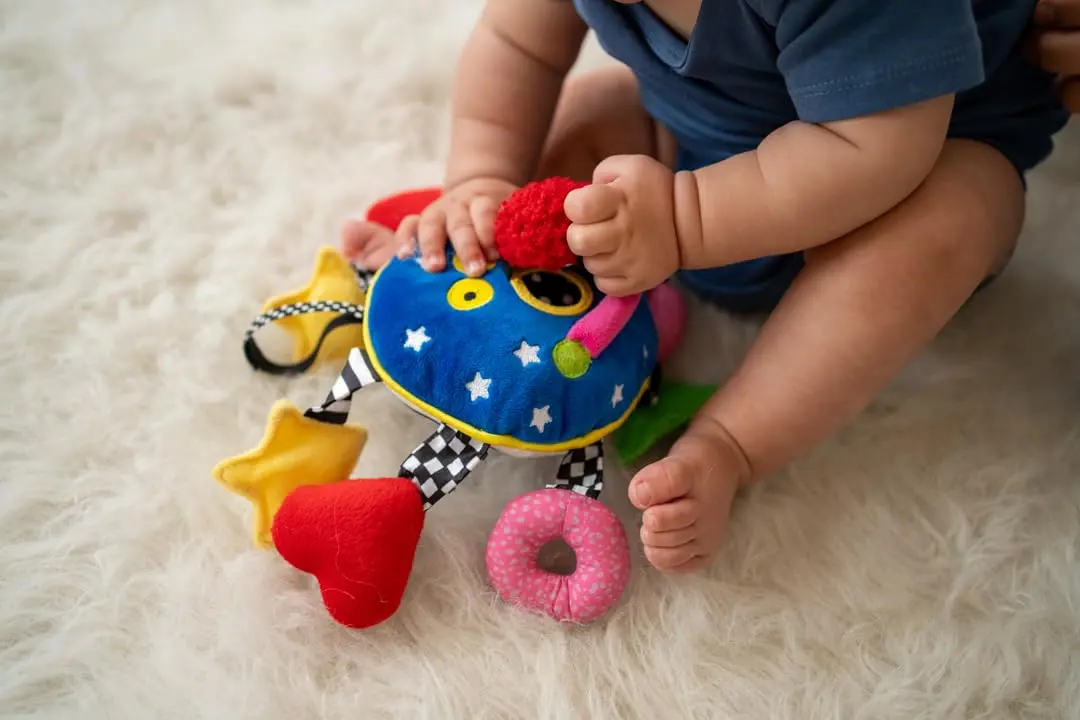 Manhattan Toy Baby Whoozit 6" Stroller and Travel Activity Toy | Multicolor Animal Toy for Babies - view 2