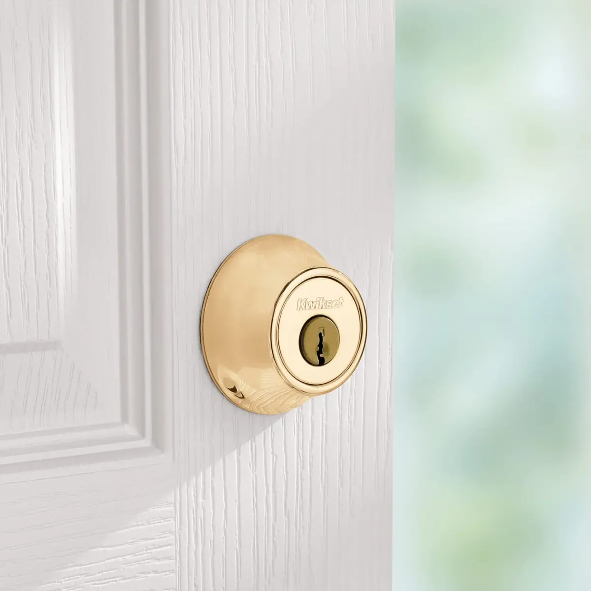 Kwikset 660 Single Cylinder Deadbolt Lock, Polished Brass Round, 2.7" L x 3.7" W x 4.3" H | Grade 3 BHMA Certified Security - view 5