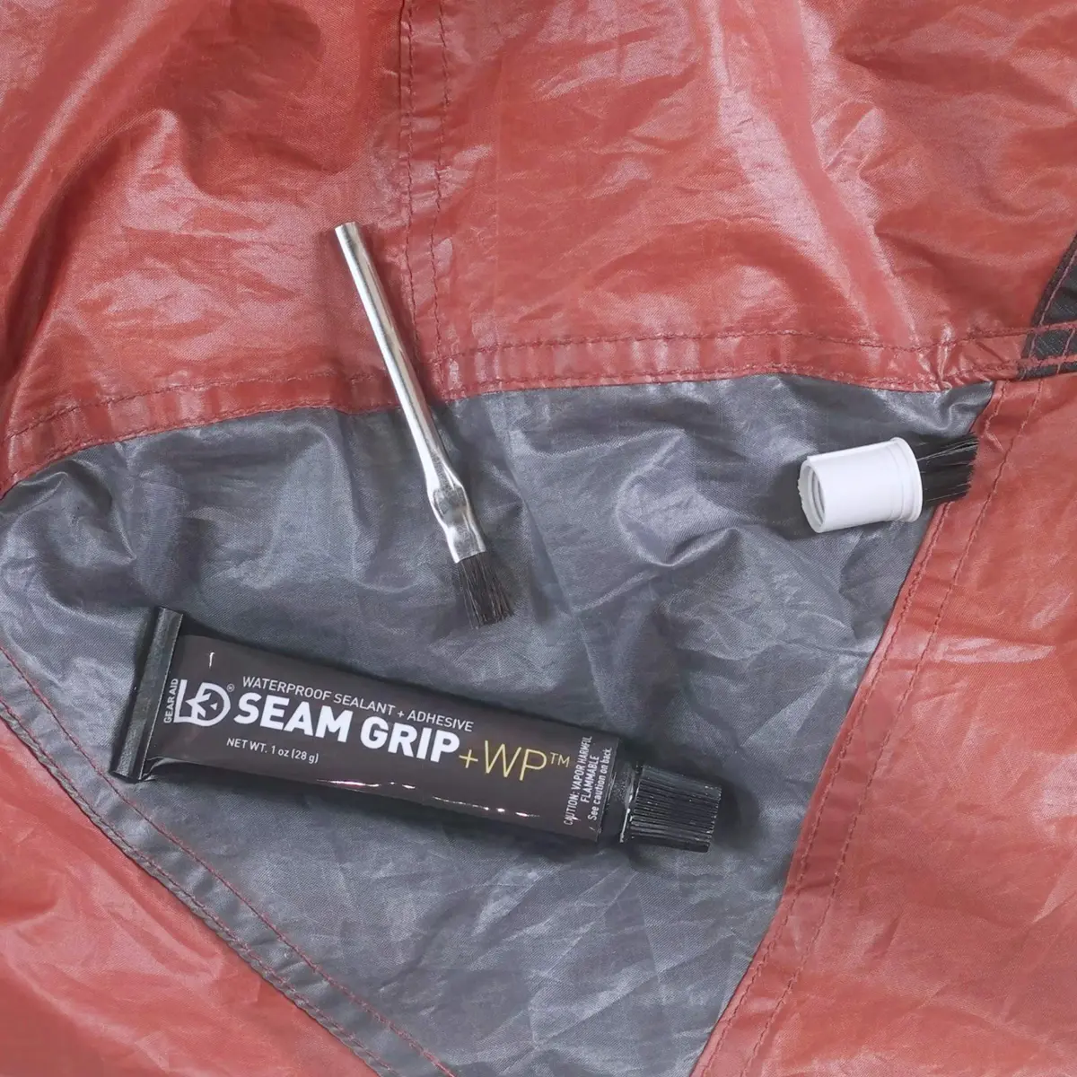 GEAR AID Seam Grip WP Waterproof Sealant and Adhesive 29.57ml (1 oz) | Repairs Tents, Jackets, and Outdoor Fabric - view 2