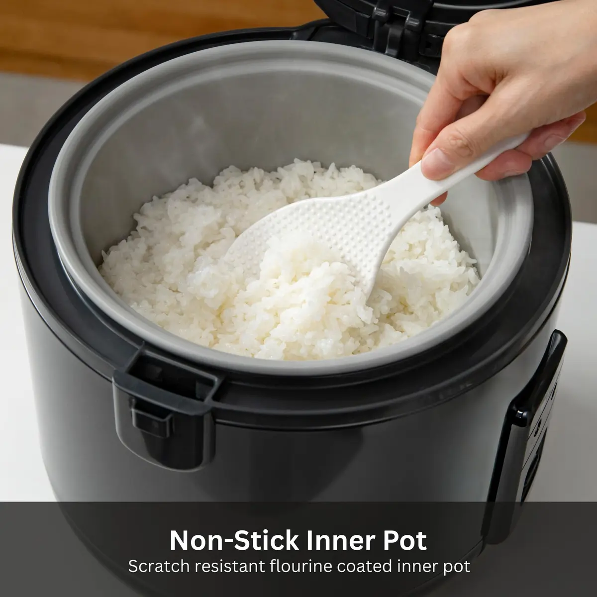 Tiger JNP-S55U-KY 3 Cup Capacity Rice Cooker with Non-Stick Inner Pot, Retractable Power Cord, and Keep Warm up to 12 hours, Black - view 3