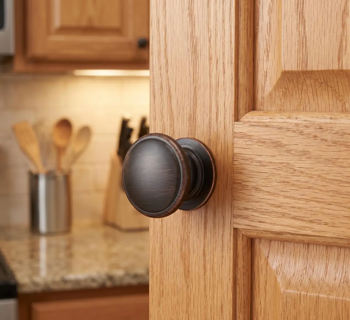 Cosmas 4702ORB Oil Rubbed Bronze Cabinet Knobs 1-1/4 Inch Diameter (3.17cm), 10-Pack | Wide Base Design for Comfortable Grip - main product image