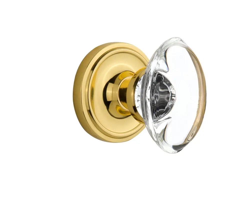 Nostalgic Warehouse Classic Rosette with Oval Clear Crystal Glass Knob, Double Dummy, Unlacquered Brass | Elegant Traditional Door Hardware - main product image