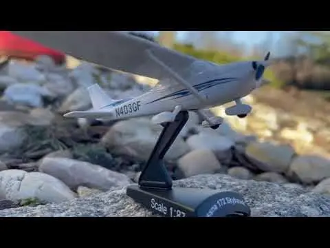 Postage Stamp Cessna 172 Skyhawk 1:87 Scale Diecast Model Airplane | Officially Licensed Collectible with Display Stand - view 2