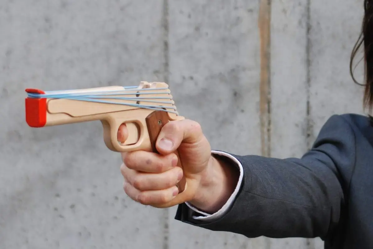 Elastic Precision Model 1911 Rubber Band Gun - Hardwood, Semi-Automatic Action, Walnut Grips (8.75" L x 5.25" H x 1.25" W) - view 2