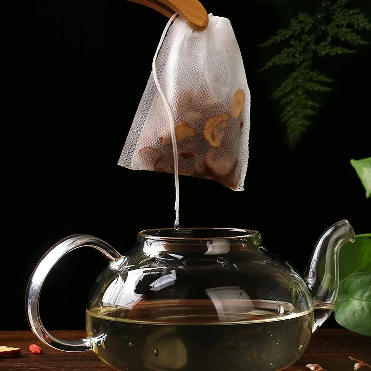 fenshine Disposable Tea Bags 200 pcs | Non-Woven Fabric, Drawstring, 7x9cm, Safe & Portable - view 4