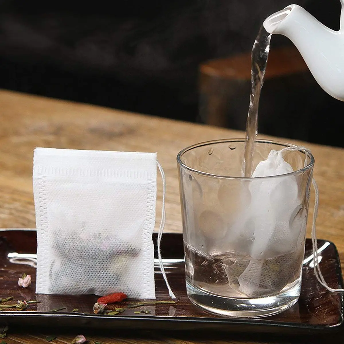 fenshine Disposable Tea Bags 200 pcs | Non-Woven Fabric, Drawstring, 7x9cm, Safe & Portable - view 3
