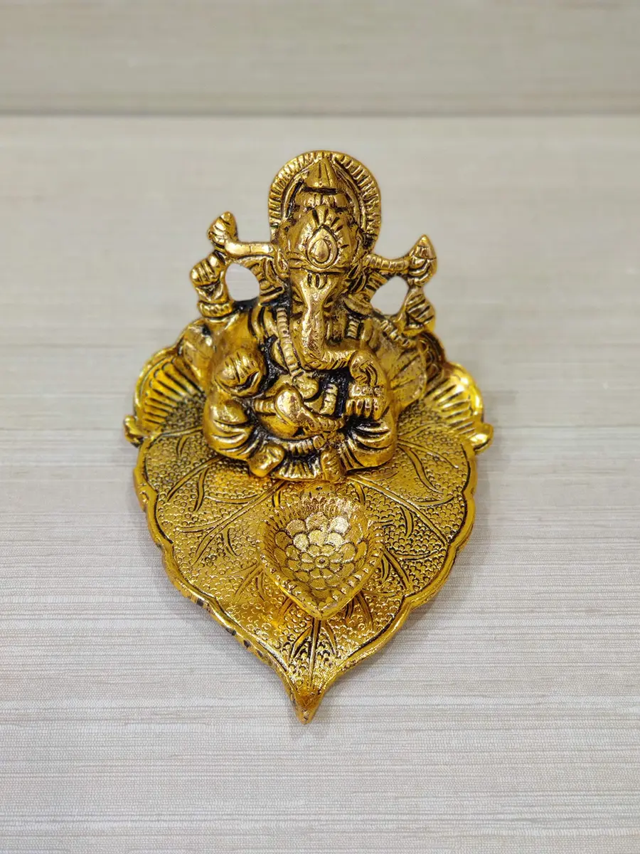 GiftNagri Golden Oxidized Antique Metal Patta Ganesha with Deepak & Batti Stand | 10cm (4in) x 13cm (5in) x 6cm (2.5in) - main product image