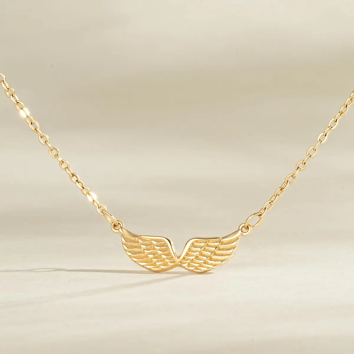 MEVECCO Dainty Angel Wings Necklace for Women | 18K Gold Plated Brass, 40.4 cm (15.7 in) Chain with 5 cm (2 in) Extender - view 5