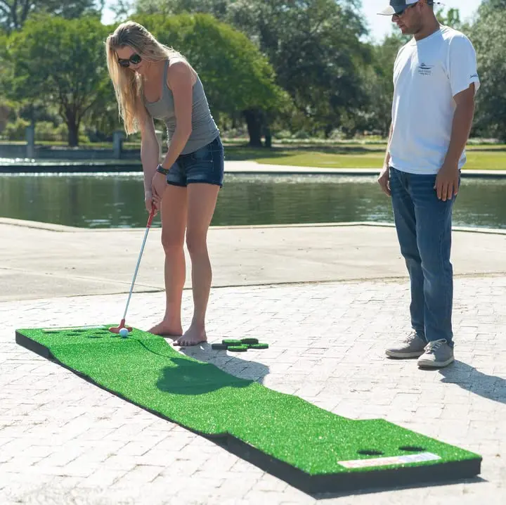 PutterBall Original Golf Putting Game Set – Backyard 12 ft Putting Green Pong Style Golf Mat with 2 Putters, 2 Balls & Hole Covers - view 6