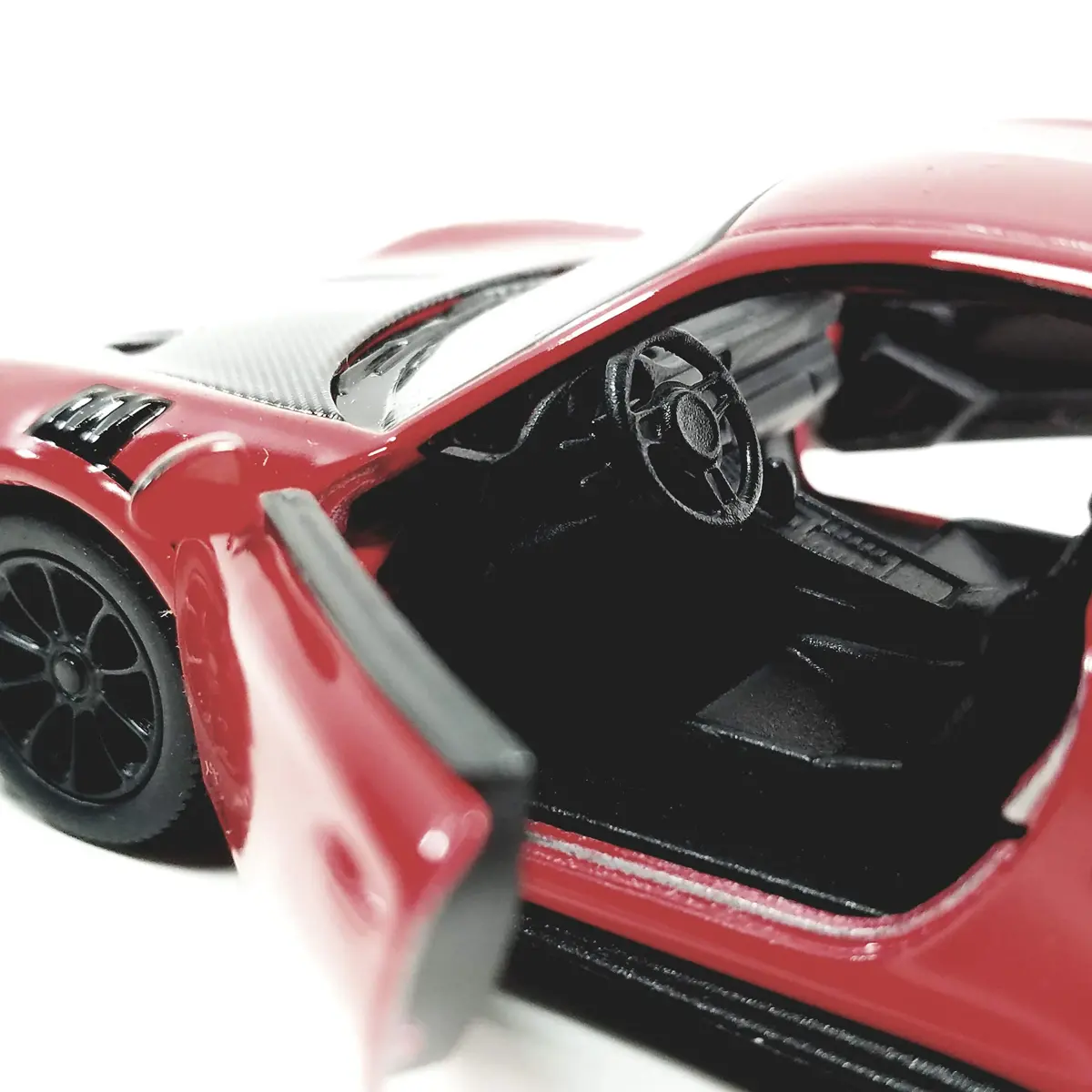 KiNSMART 2010 Porsche 911 GT2 RS 1:36 Scale 5 inch Die Cast Metal Model Toy Car (Red) | Functional Opening Doors & Pull-Back Motor Action - view 4