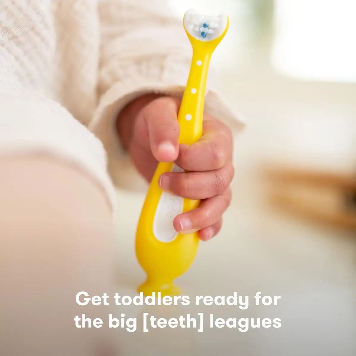Frida Baby Training Toothbrush for Toddlers | Triple-Angle Bristles, Silicone Handle, Stay-Put Suction Cup (Yellow) - view 2