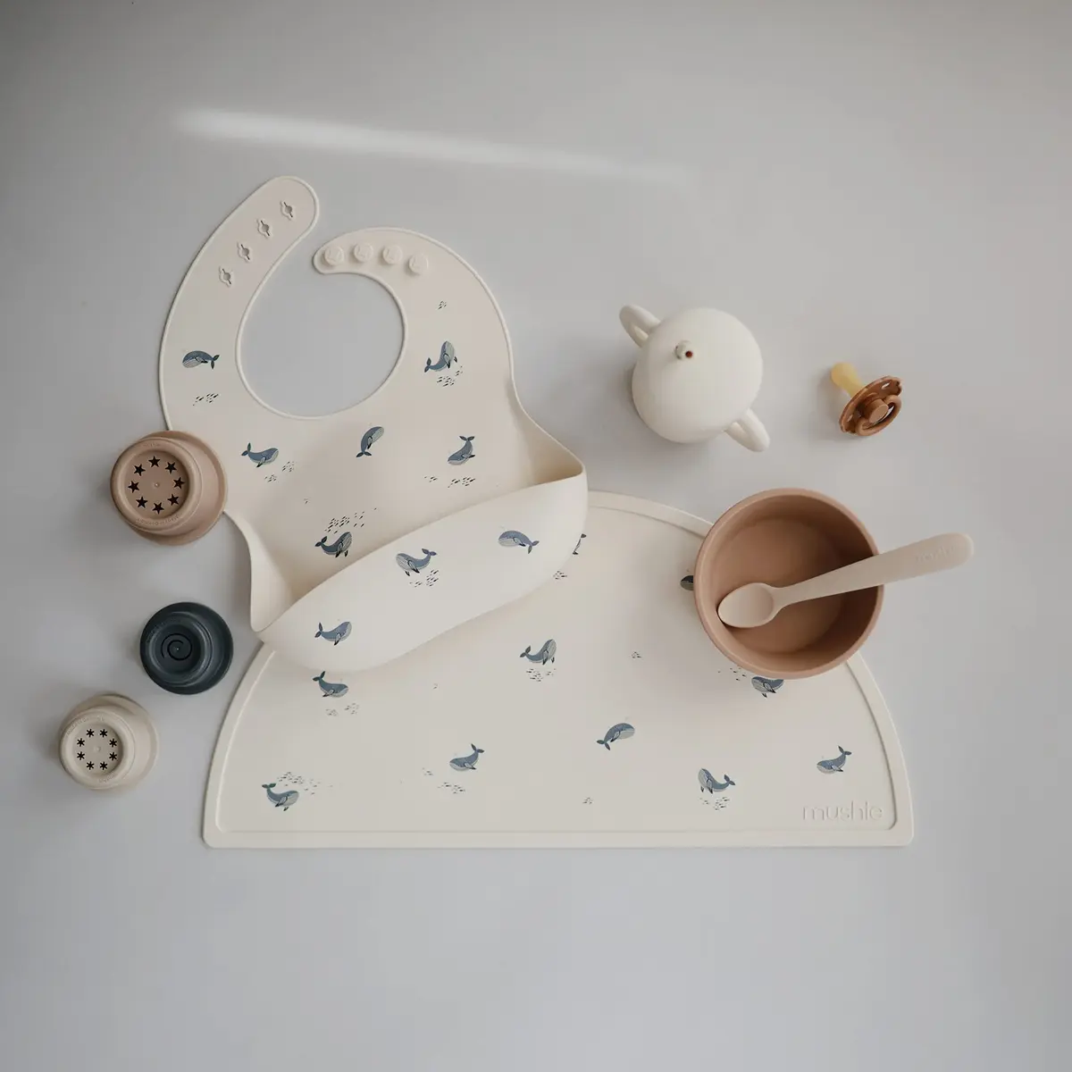 mushie Silicone Baby Bib Whales Pattern | 113 g (4 oz) - view 2