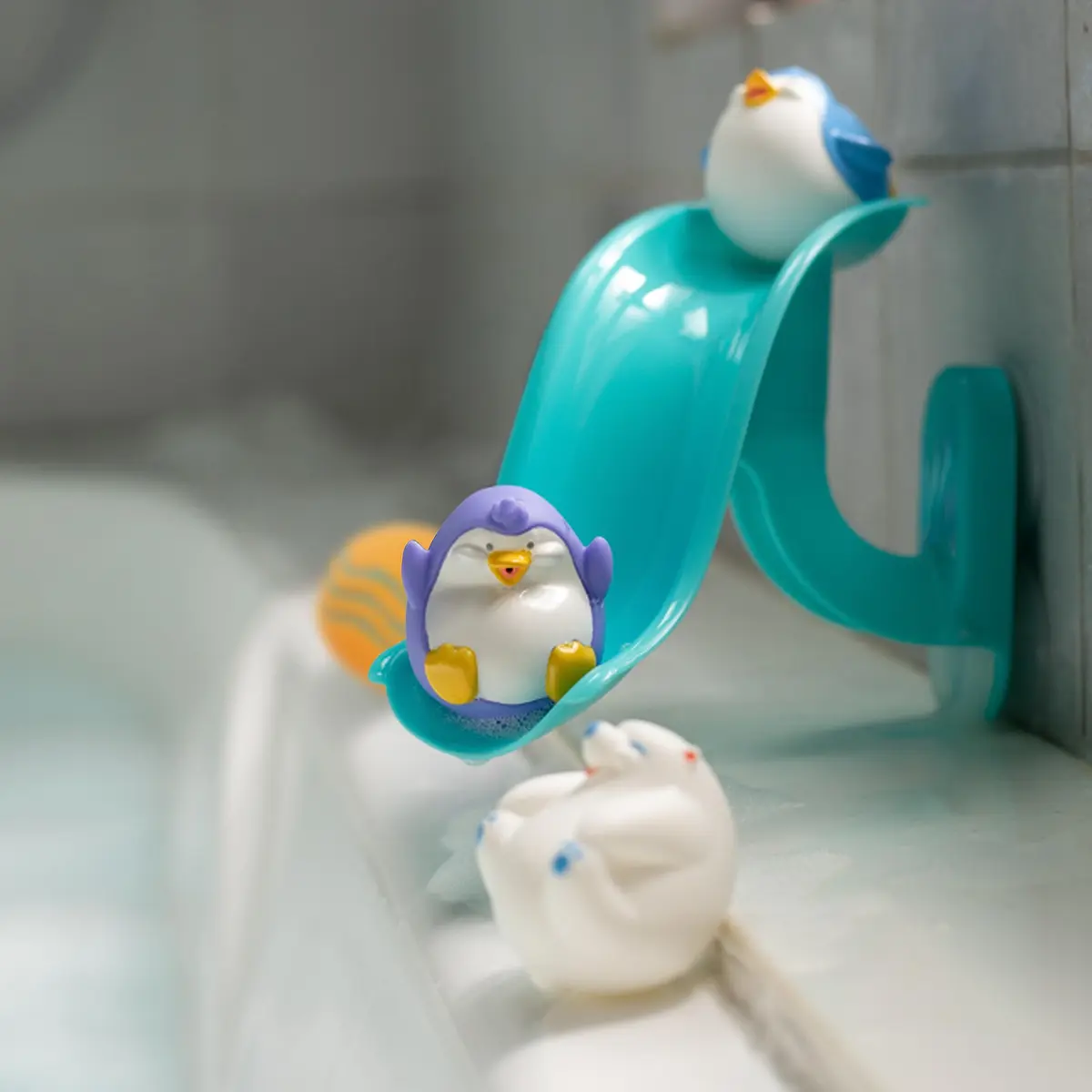 Nuby Penguin Slide Bath Toy Play Set with 4 Bath Squirters | Baby Bath Toys for 12+ Months, Suction Cup Attaches to Shower Wall - view 2