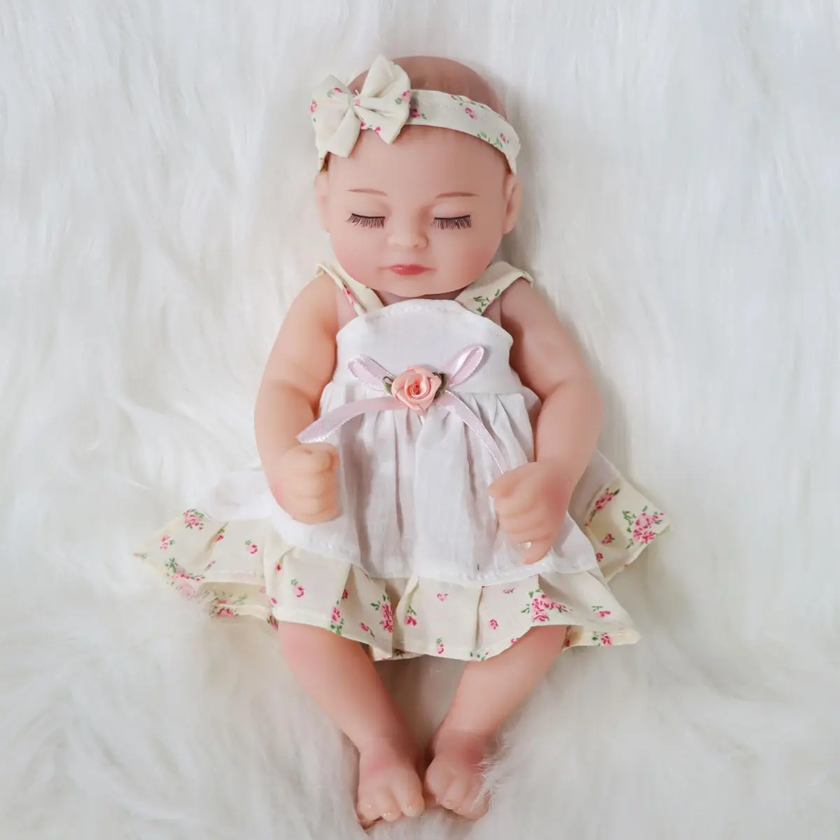 JRLCGYP Realistic Reborn Baby Girl Doll 10 Inches (25.4 cm) with Flower Dress | Soft Vinyl, Lifelike Newborn Look, Ideal Birthday Gift for Kids 3+ - view 2