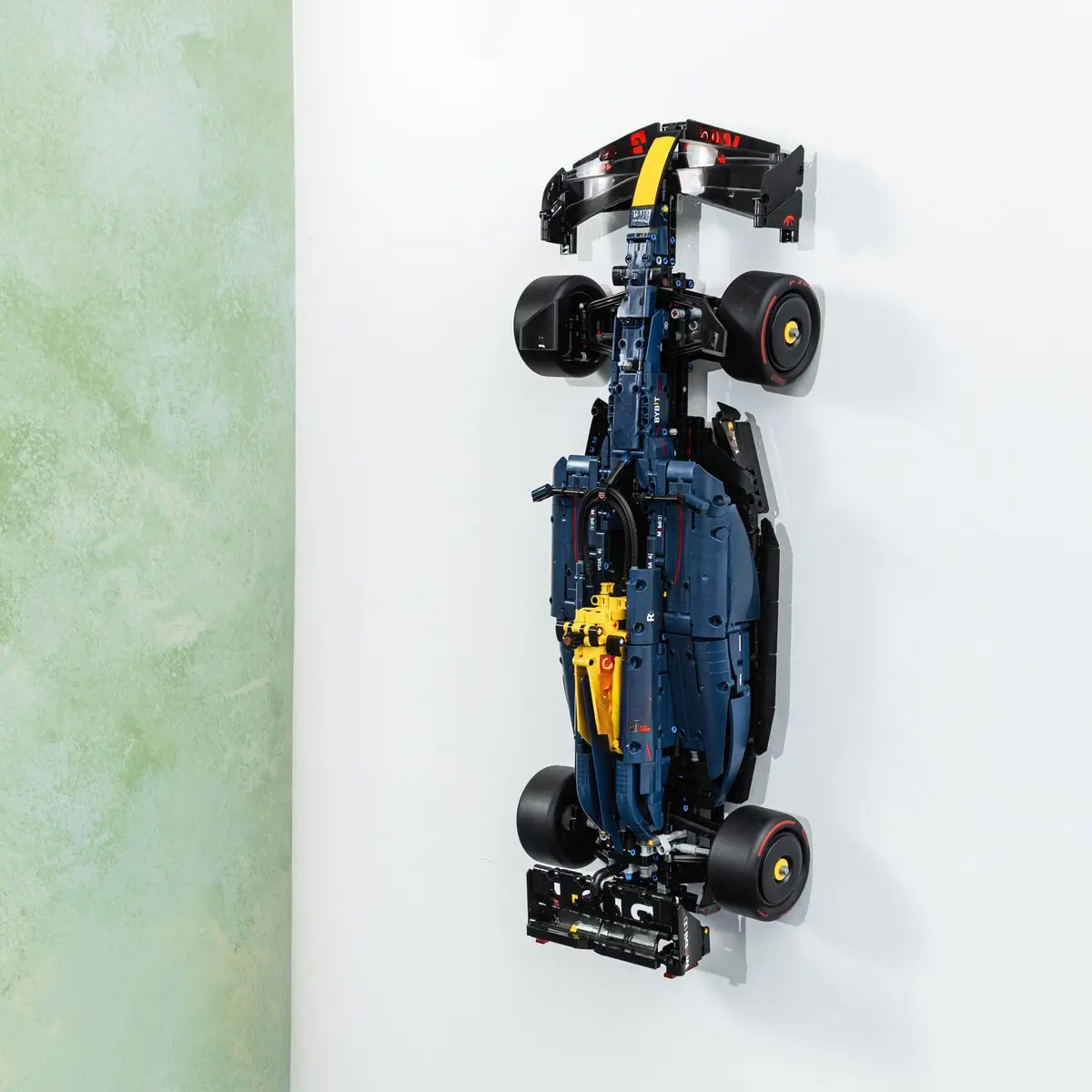 Brickify Wall Mount Bracket for Lego Technic Red Bull RB20 42206 | Secure Display Solution (13cm L x 10cm W x 2.3cm H) - main product image