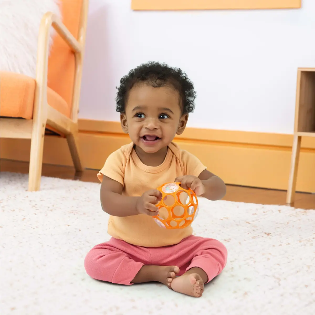 Bright Starts Oball Rattle Ball, Easy-Grasp Infant Toy with Finger Holes, Orange, 0-10cm (4in) - view 7